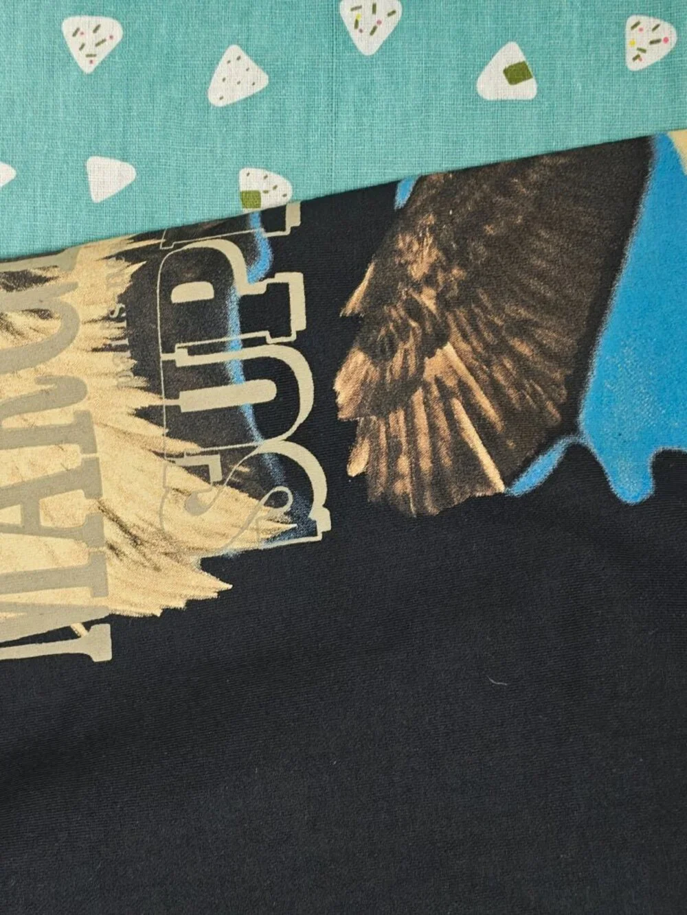 Supreme Black Sweatpants with Eagle Graphic and Tan & Blue Accents